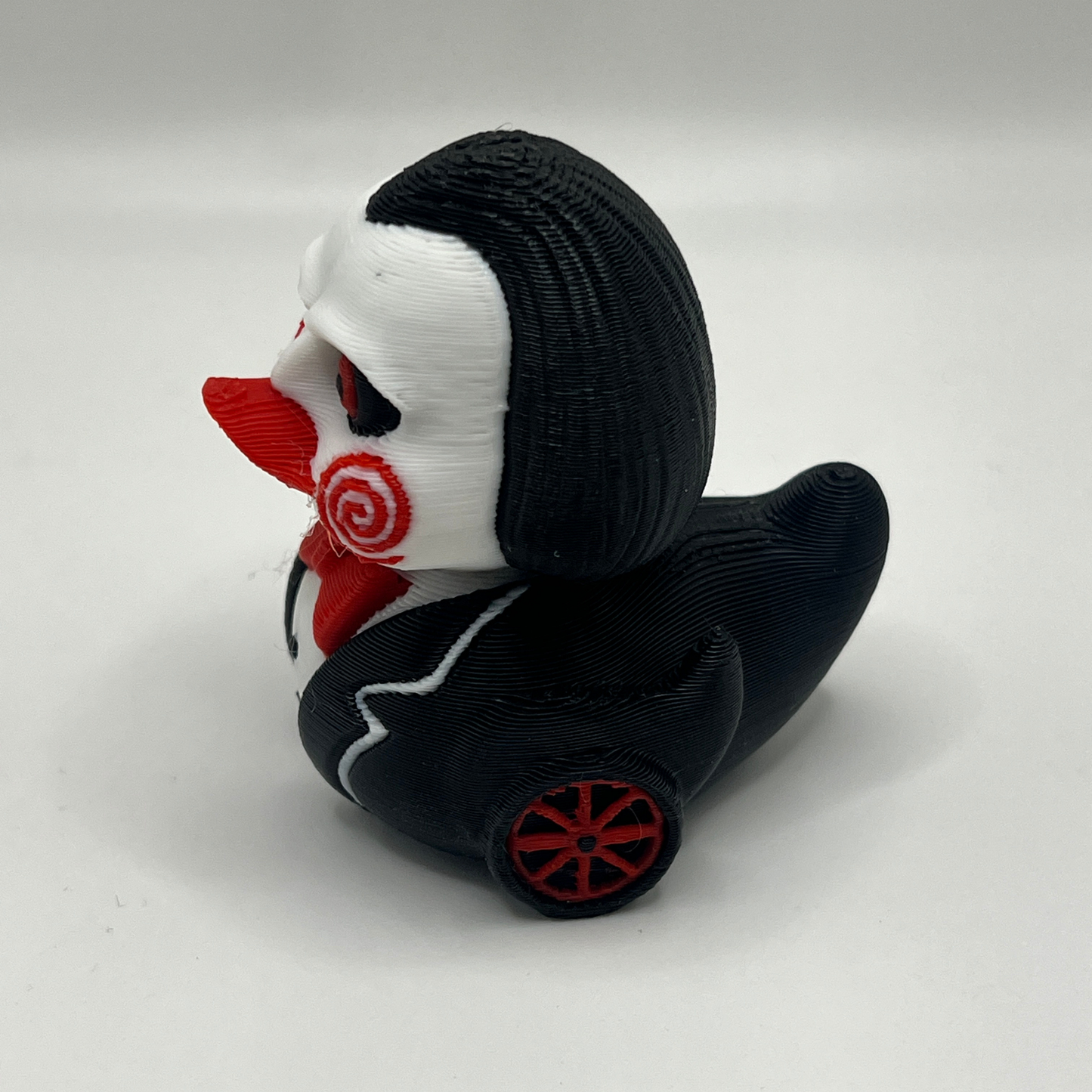 Red Spiral Creepy Doll Duck